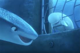 An animated scene from the Pixar film "Finding Dory." Underwater scene where Destiny the whale shark is speaking inside a pipe. A beluga whale is separated by iron bars next to her.