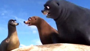 An animated scene from the Pixar film "Finding Dory." Two large sea lions staring down at another 'goofy' looking sea lion.
